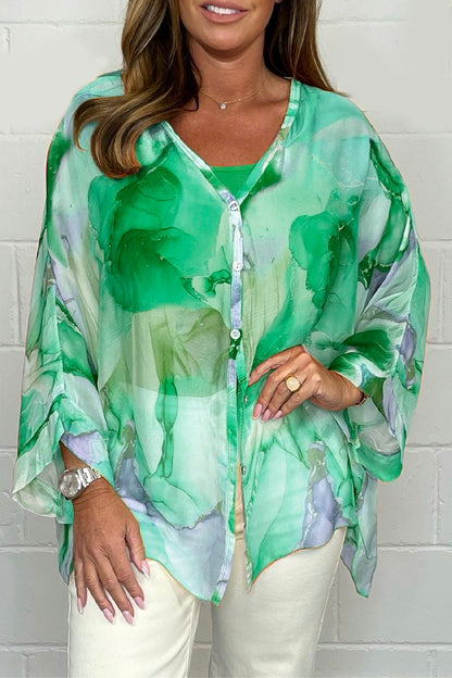 Zomerse dames blouse met bloemenprint en pofmouwen