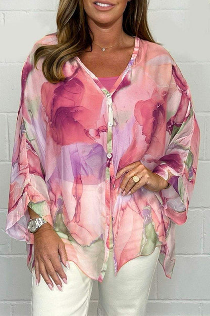 Zomerse dames blouse met bloemenprint en pofmouwen