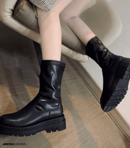 Zwarte leren winterlaarzen met grove zool elegant