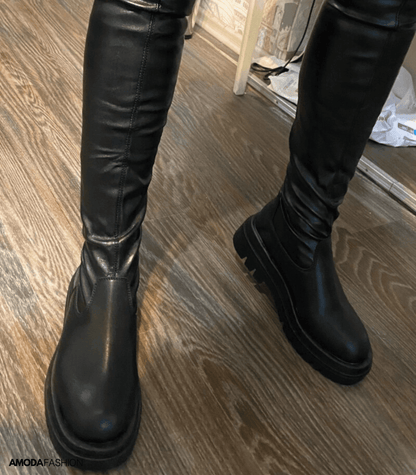 Zwarte leren winterlaarzen met grove zool elegant